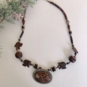 Necklace with wooden elephant beads.